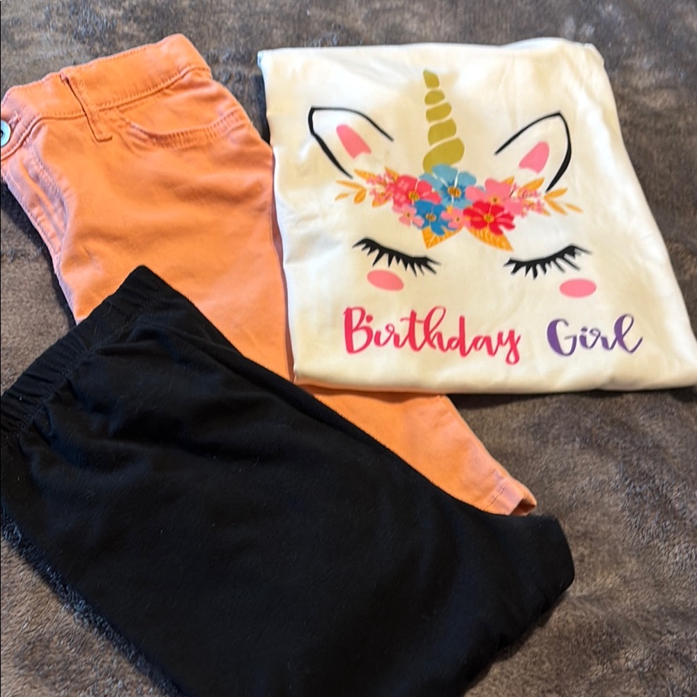 Girls Unicorn Birthday Tee with matching black Leggings and creamsickle Shorts.
